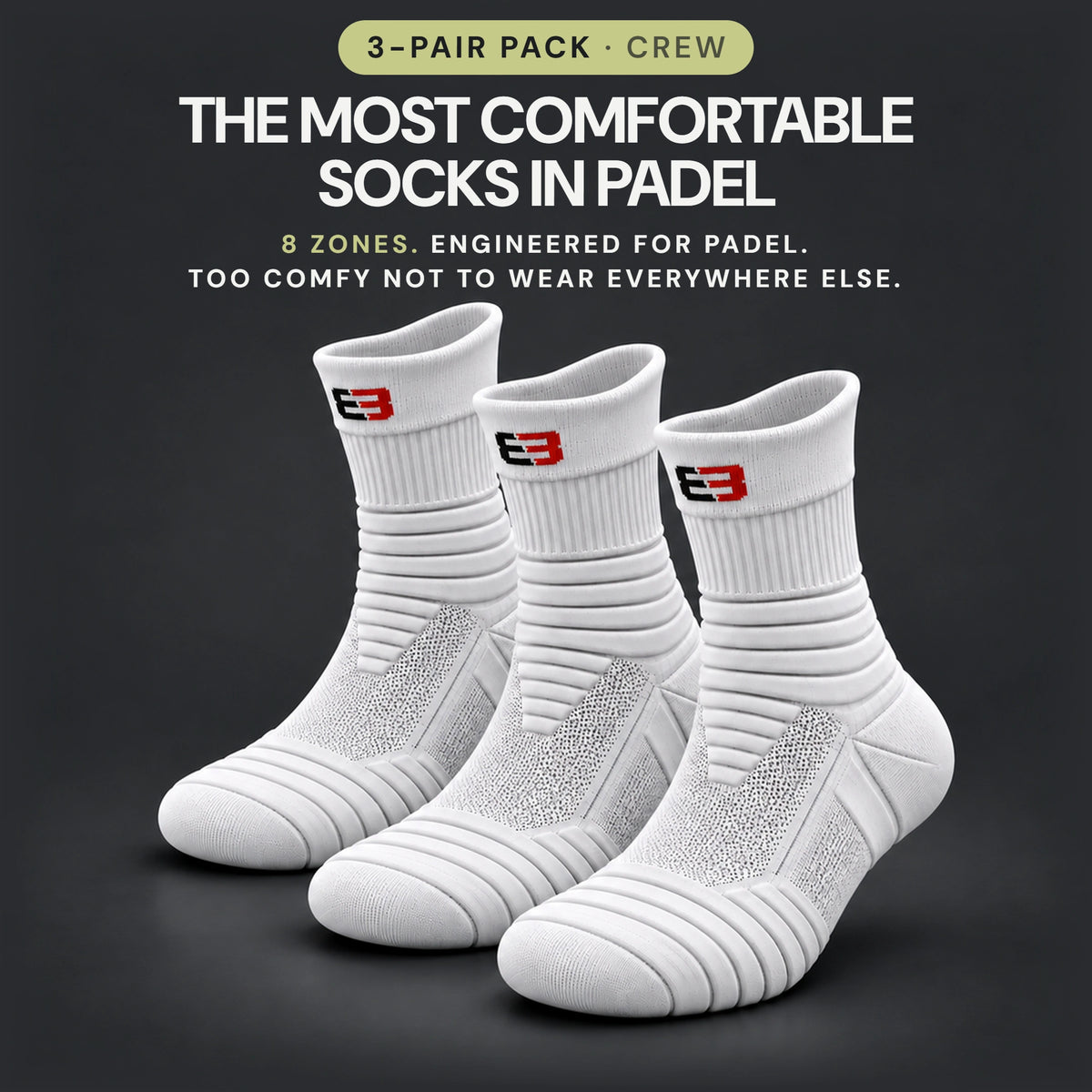 Three white CourtMatrix padel crew socks, a 3-pair pack. The most comfortable socks in padel: 8 zones, engineered for padel, too comfy not to wear everywhere else